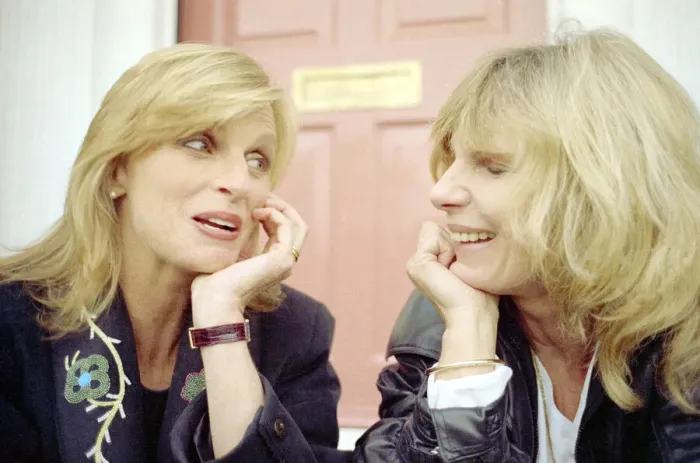 Framed Print : Linda McCartney, wife of fomer Beatle Paul McCartney, has a chat with her friend Carla
