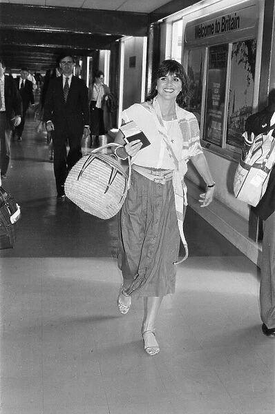 Linda Ronstadt arrives at London Heathrow Airport on their way to Los Angeles