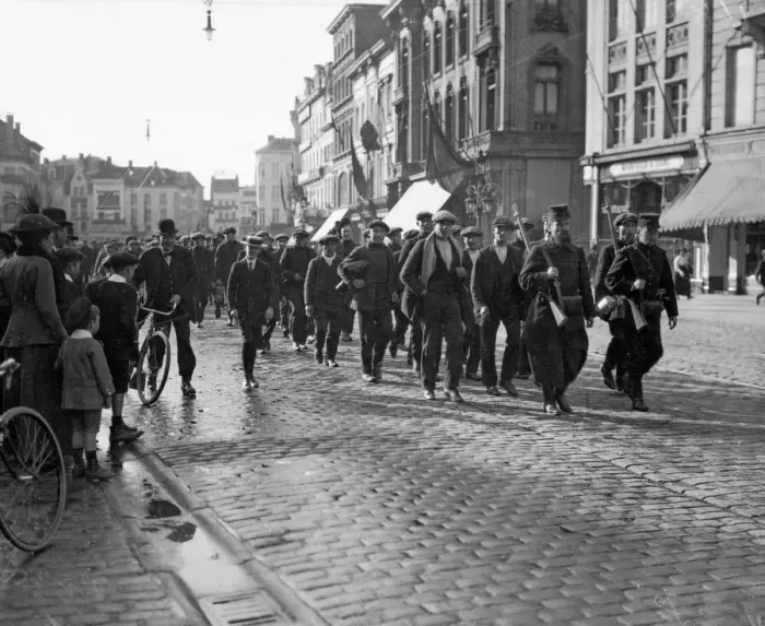 Framed Print : The last line of Belgian civilians called up to bolster the line march off into action Framed Print : The last line of Belgian civilians called up to bolster the line march off into action