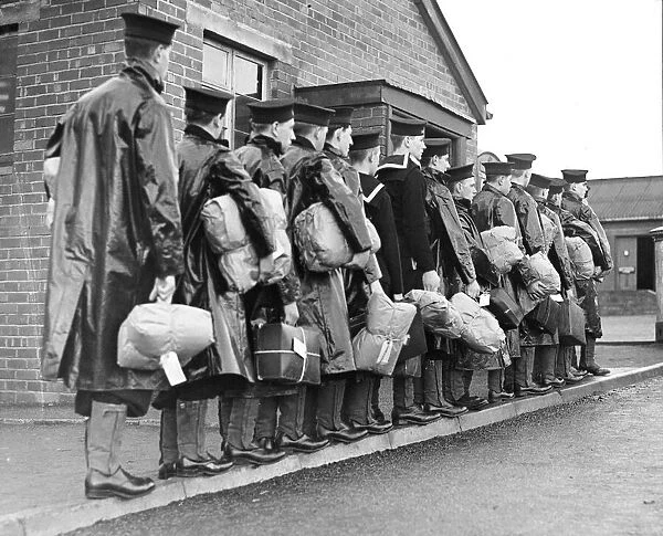 Line of civilians due to enter HMS Rayleigh in Plymouth