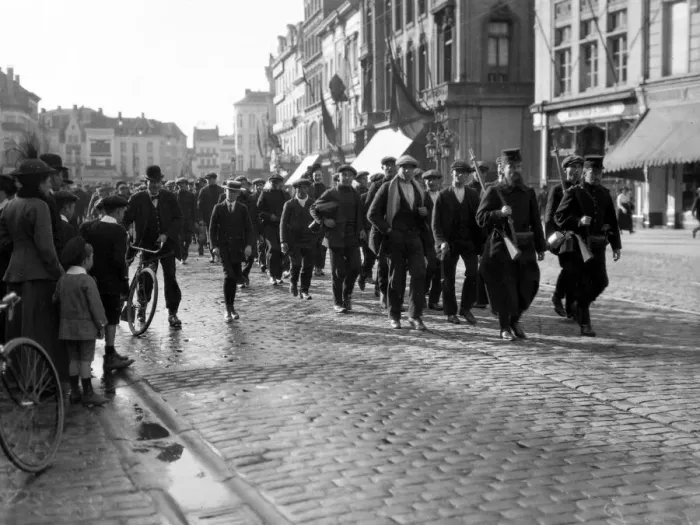Framed Print : Last line of recruits called up going into action. Belgian troops marching down street