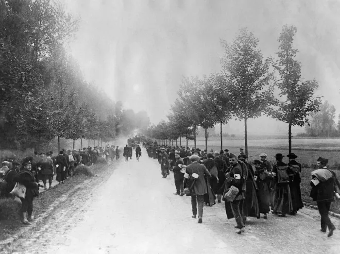 Framed Print : Last line of recruits called up going into action. Belgian troops marching down street
