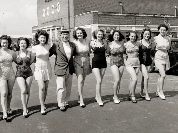 Framed Print : A line-up of girls, women wearing swimming costumes bathing suits bikinis Framed Print : A line-up of girls, women wearing swimming costumes bathing suits bikinis