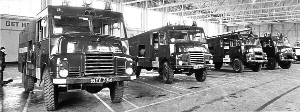 A line-up of Green Goddess fire engine ready for action in the hanger at RAF Catterick