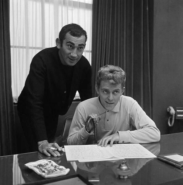 Lionel Bart (standing) at his office in Shaftesbury Avenue, with Shane Fenton