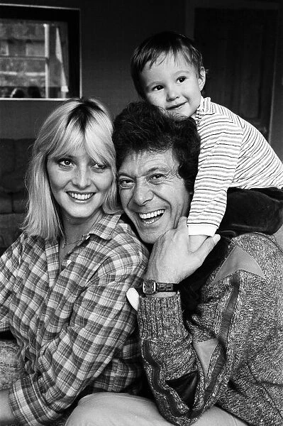 Lionel Blair pictured at home with his wife Susan and their son. 19th October 1983