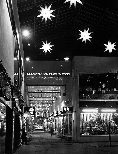 Lit up for Christmas - bright stars and other illuminations in the City Arcade, Coventry