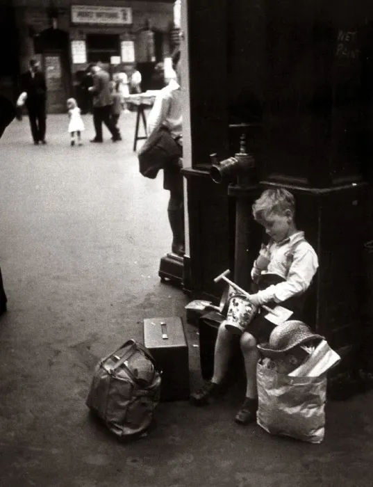 Framed Print : A little boy Kenneth James waits for his train at the station ready to take him home Framed Print : A little boy Kenneth James waits for his train at the station ready to take him home