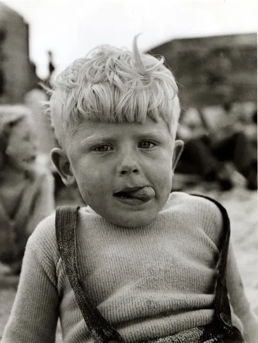Framed Print : Little boy with sand all over him, tousled hair and ice cream tongue sticking out his Framed Print : Little boy with sand all over him, tousled hair and ice cream tongue sticking out his