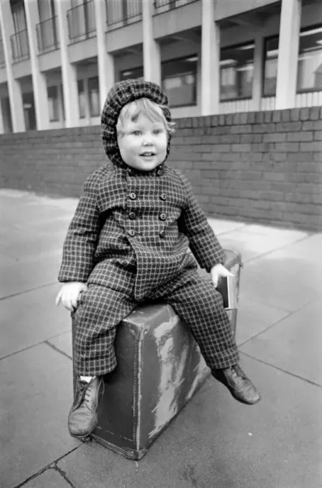 Framed Print : Little boy sitting on a suitcase. November 1969 Z11024-006
