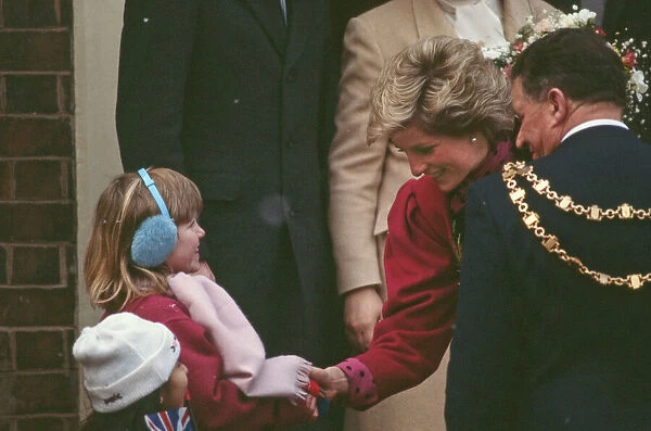 A little girl meets The Princess. Princess Diana meets and greets the people of Walsall