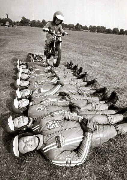 Little John Shipley leaps over 9 men on his motorcycle - 1976 Motor Cycles - Stunts