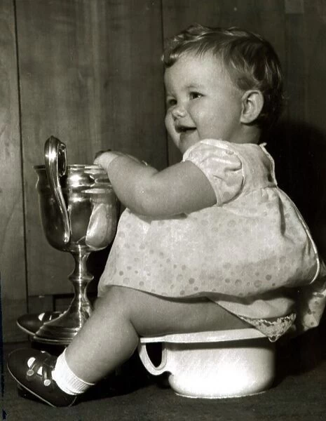 Little Miss Moment (9 months old) goes to the ladies toilet after winning a baby show of