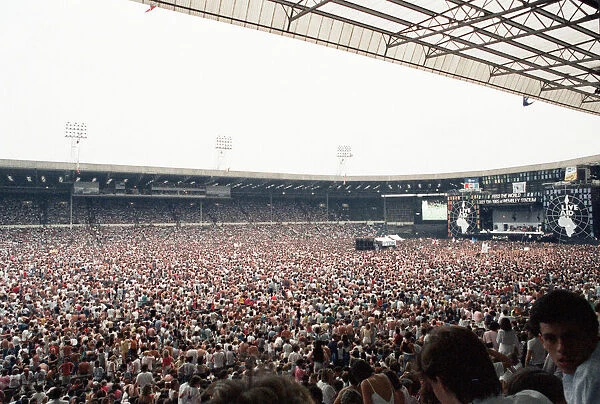 Live Aid concert held at Wembley Stadium, London to raise funds for relief of the ongoing
