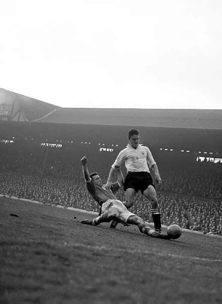 Liverpool 4 v. Fulham 3 Jimmy Hill is beaten to the ball by Saunders of Liverpool