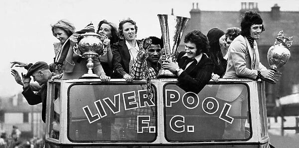 Liverpool celebrate their title win with an open top bus parade through the city centre