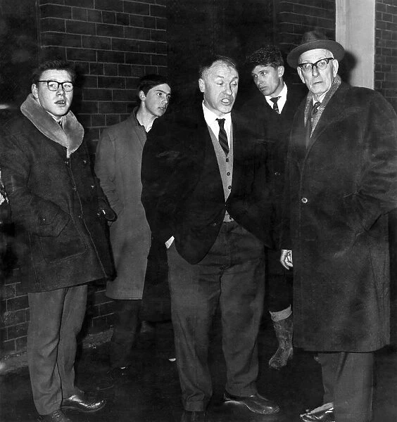 Liverpool Chairman T. V. Williams, manager Bill Shankly and head groundsman Arther Riley