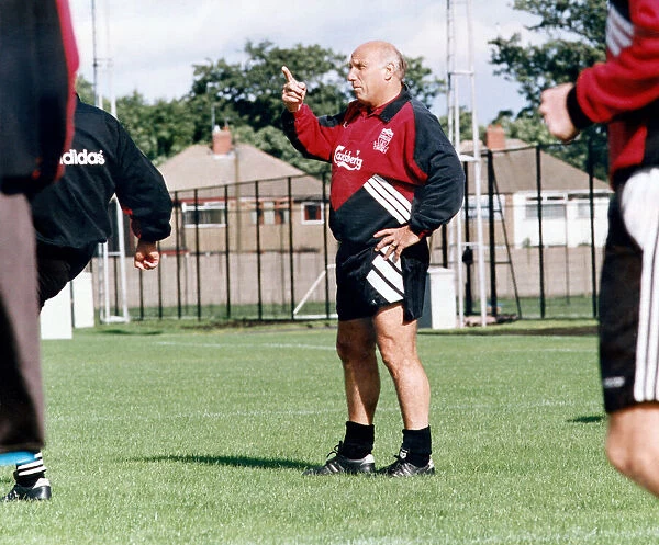 Liverpool coach Ronnie Moran gives instructions during a training session