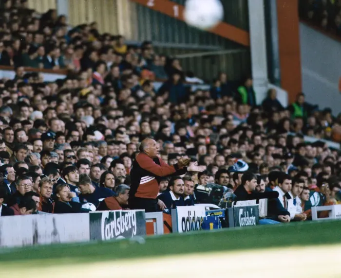 Framed Print : Liverpool coach Ronnie Moran shouting out instructions from the dugout during a Premier Framed Print : Liverpool coach Ronnie Moran shouting out instructions from the dugout during a Premier