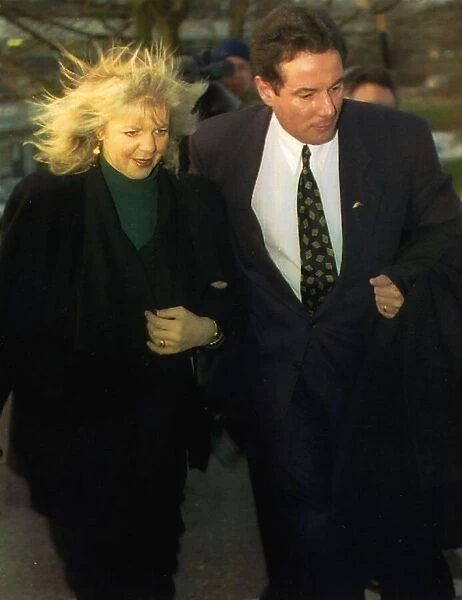 Former Liverpool Councillor Derek Hatton with his wife Shirley at Mold Crown Court for a