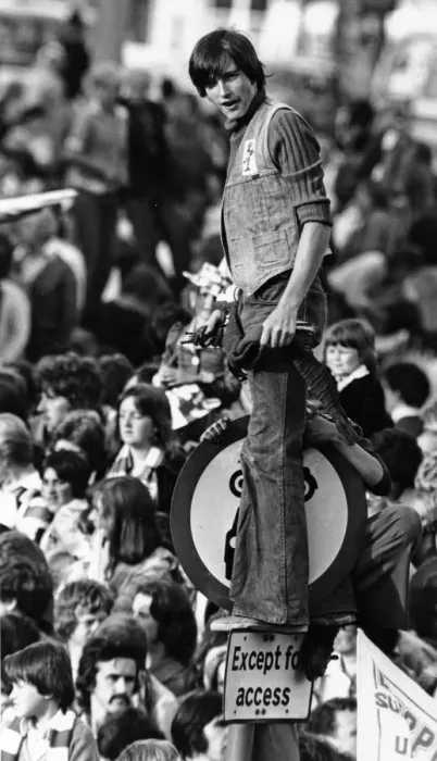 Framed Print : A Liverpool fan gets an elevated view on top of a road sign in William Brown Street as Framed Print : A Liverpool fan gets an elevated view on top of a road sign in William Brown Street as