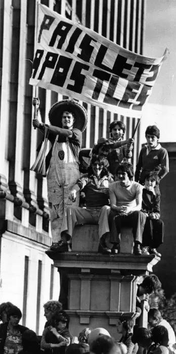Framed Print : Liverpool fans carrying a Paisleys Apostles'banner as they gather with Framed Print : Liverpool fans carrying a Paisleys Apostles'banner as they gather with