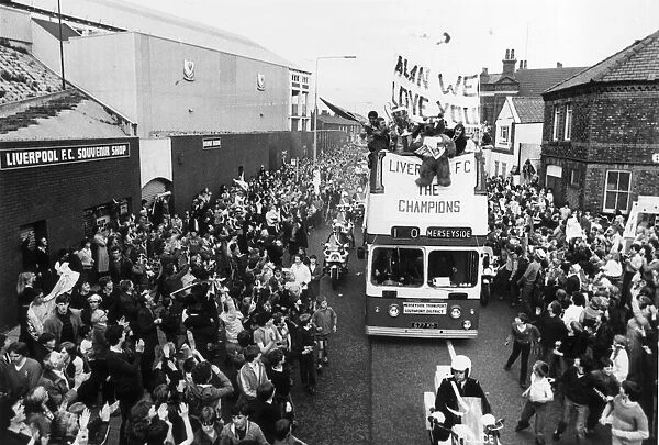 The Liverpool FC Tour Bus passes Anfield Football Club in Walton