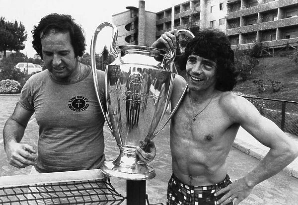Liverpool football star Kevin Keegan poses with the European Cup trophy at the team hotel