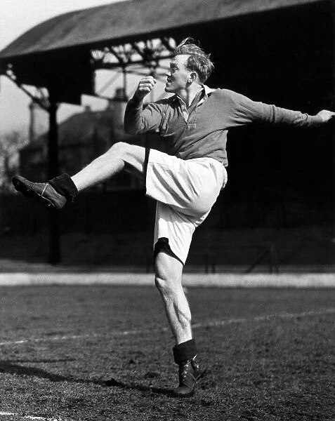 Liverpool footballer Albert Stubbins in action during a training session. Circa 1947