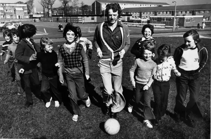 Framed Print : Liverpool footballer David Fairclough finds time for a kick about with some of