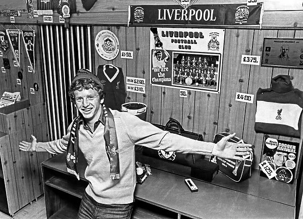 Liverpool footballer David Fairclough poses at the new club Souvenir shop at Anfield