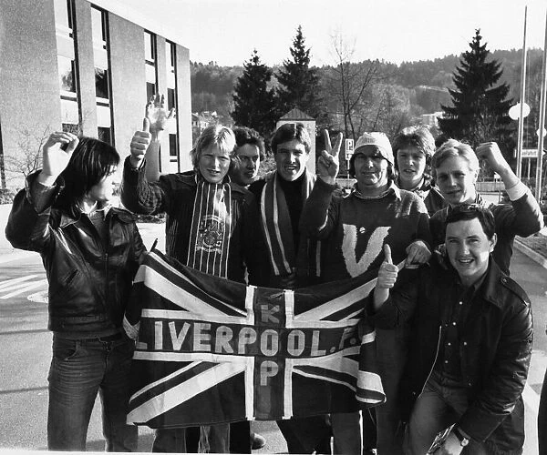 Liverpool footballer Emlyn Hughes mingles with travelling Liverpool fans in West Germany