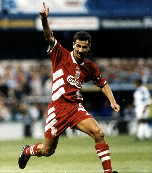 Liverpool footballer Ian Rush celebrates after scoring a goal against QPR during