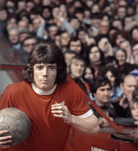 Liverpool footballer Kevin Keegan walks out onto the pitch before a match at Anfield