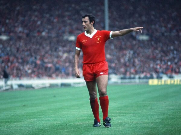 Liverpool footballer Ray Kennedy gives instructions during the Charity Shield match