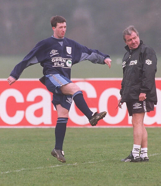 Liverpool footballer Robbie Fowler watched in training by England manager Terry Venables