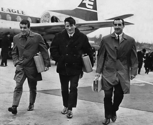 Liverpool footballers Ian Callaghan, Tommy Smith and Gerry Byrne arrive at Speke Airport