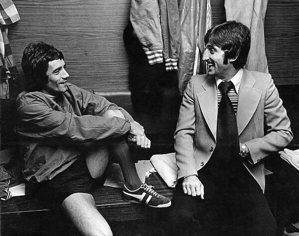 Liverpool footballers Kevin Keegan (left) and David Johnson share a joke in the dressing
