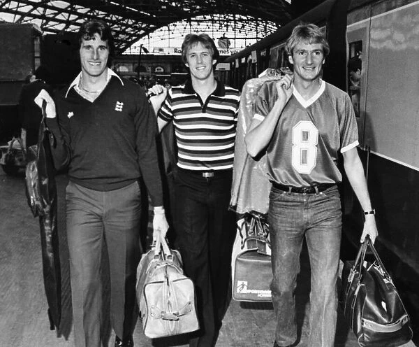 Liverpool footballers Ray Clemence, Phil Neal and Phil Thompson at Lime Street Station