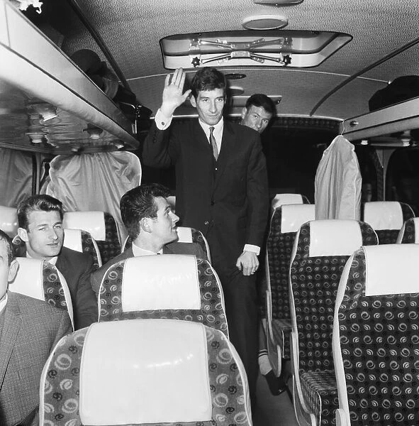 Liverpool forward Geoff Strong leaves the bus as the Liverpool team arrive at Euston