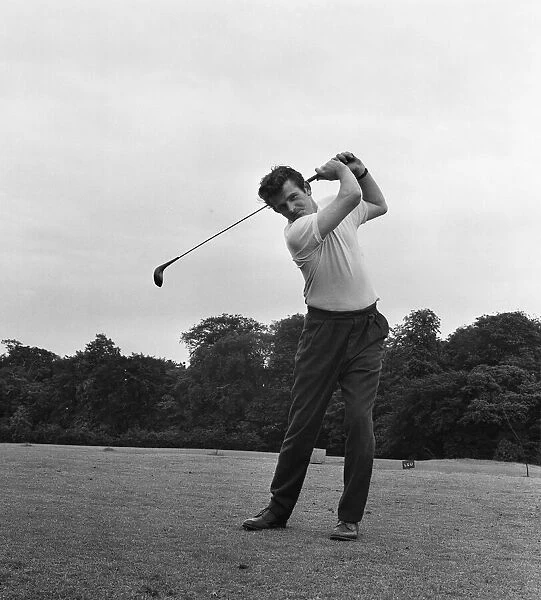 Liverpool goalkeeper Tommy Lawrence enjoying a round of golf at Leigh Golf Club ahead of