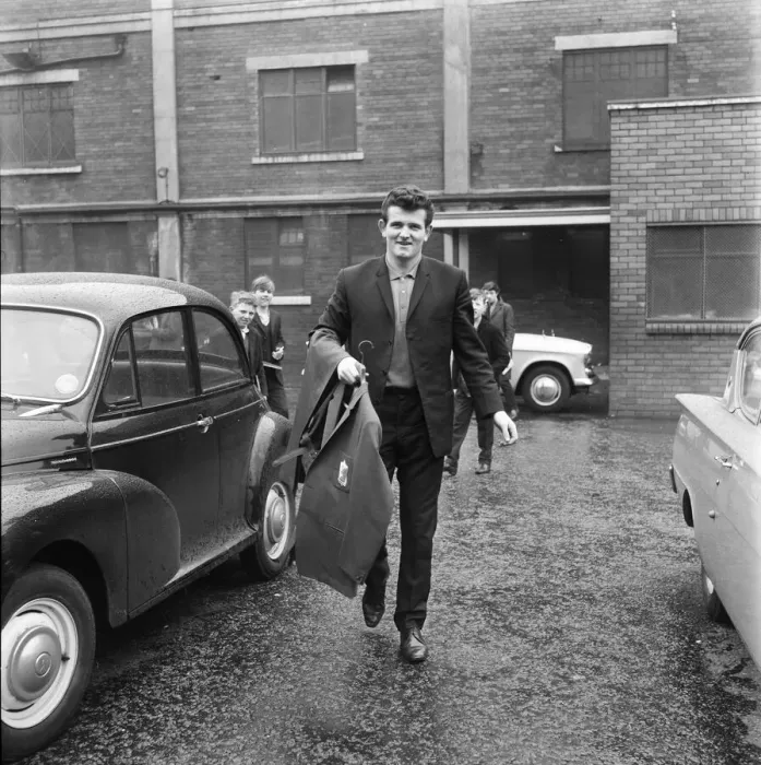Framed Print : Liverpool goalkeeper Tommy Lawrence picks up his new suit ahead of the team Framed Print : Liverpool goalkeeper Tommy Lawrence picks up his new suit ahead of the team
