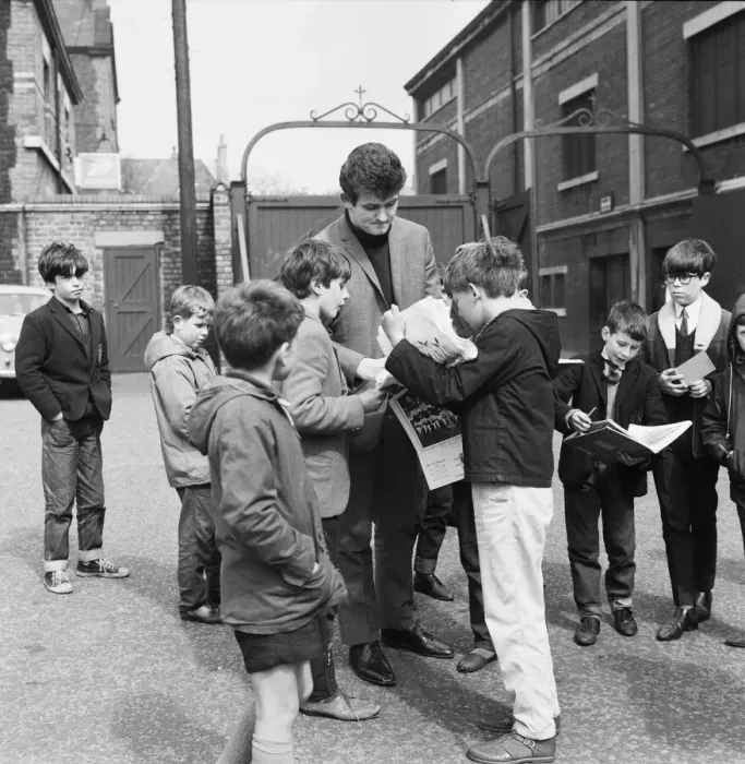Framed Print : Liverpool goalkeeper Tommy Lawrence sign autographs for fans outside Anfield football Framed Print : Liverpool goalkeeper Tommy Lawrence sign autographs for fans outside Anfield football