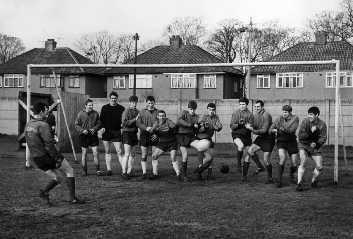 Framed Print : Liverpool Goalkeeper Tommy Lawrence takes a pot shot at the rest of the team