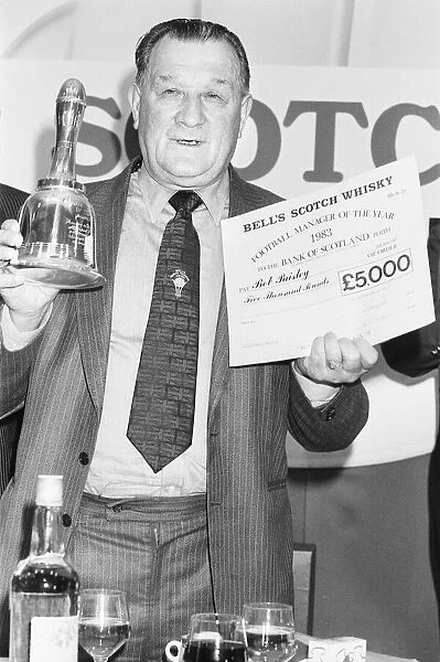 Liverpool manager Bob Paisley accepts his award for Bells Manager of the Year at a