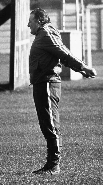 Liverpool manager Bob Paisley breathing in the fresh air during a training session
