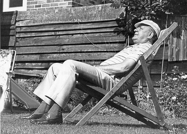 Liverpool manager Bob Paisley enjoys the sunshine as he sits in a deckchair in the back