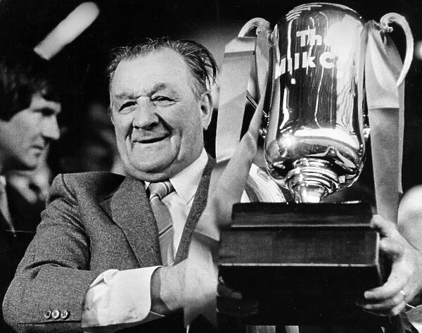 Liverpool manager Bob Paisley with the Milk Cup trophy following his side