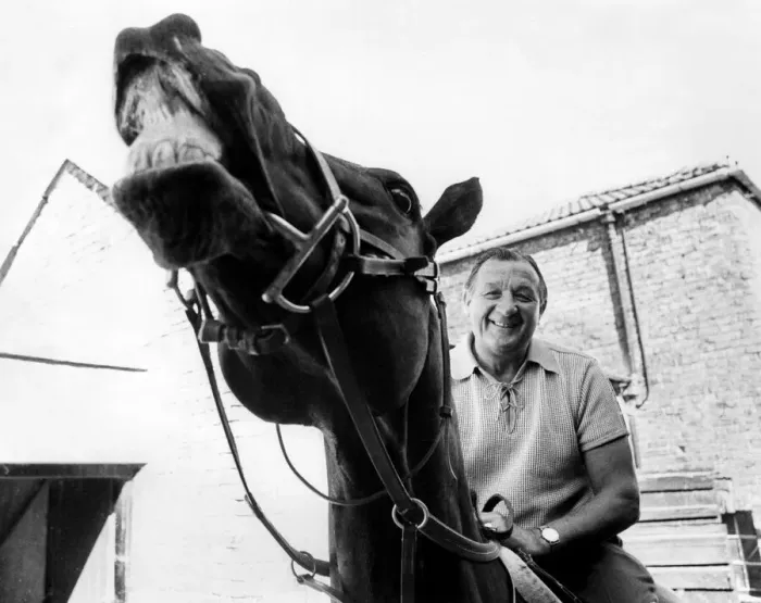 Framed Print : Liverpool manager Bob Paisley pictured on a racehorse at a racing stables. June 1976 Framed Print : Liverpool manager Bob Paisley pictured on a racehorse at a racing stables. June 1976