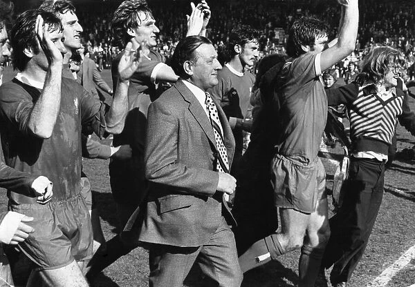 Liverpool manager Bob Paisley and the rest of the team applaud the Liverpool fans on a